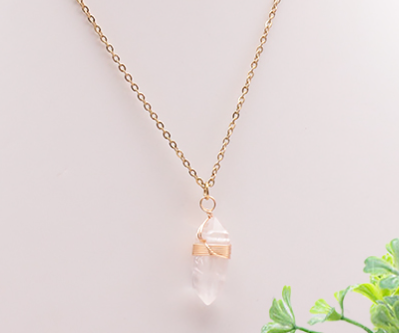 Collier pointe doré cristal de roche